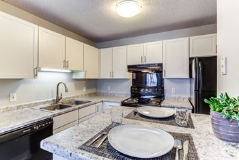 Modern Kitchen With Custom Cabinet at Audenn Apartments, Bloomington